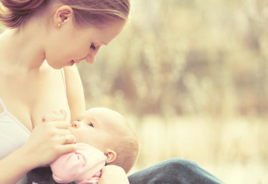 Mother Feeding Her Baby