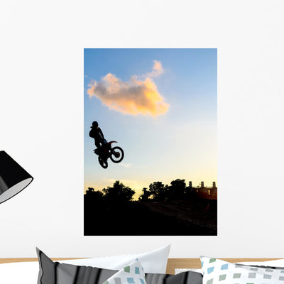 Motor Cross with Silhouette shown on a wall