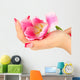 Closeup of hands of young woman with elegance manicure and Wall Decal