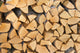 Pile of Wood Logs Ready for Winter Wall Mural