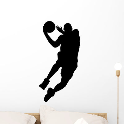 Basketball Player with Ball Wall Decal shown on a wall