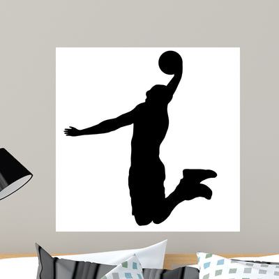 Basketball Player with Ball shown on a wall