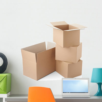 Stacked Cardboard Boxes Wall Decal shown on a wall