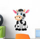 Cute Cow Sitting