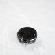 Hockey puck on ice. Wall Decal