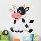 Cute cow cartoon sitting Wall Decal