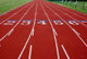 Lanes on a Red Track Wall Mural