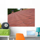 Red asphalt shingle roofing on a roof and chimney Wall Mural