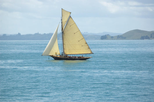 Vacation under vintage sails of leisure yacht Wall Mural
