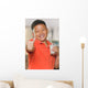 Young Asian Boy with Wall Mural
