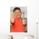 Young Asian Boy with Wall Mural