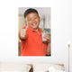 Young Asian Boy with Wall Mural