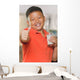 Young Asian Boy with Wall Mural