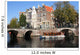 Historic Amsterdam touringboat Wall Mural