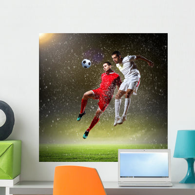 Two Football Player shown on a wall