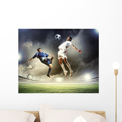 Two Football Player shown on a wall
