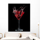 Red Cocktail Splashing Into Glass on Black Wall Mural