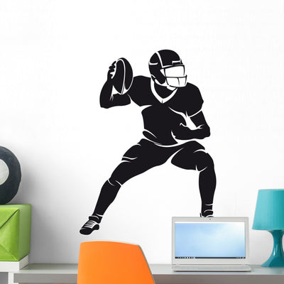 American Football Player Silhouette shown on a wall