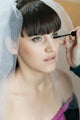 Makeup Artist Applying Eyelashes Wall Mural