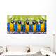 macaws sitting on log. Wall Mural
