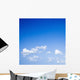 Blue sky with some white puffy clouds. Wall Decal