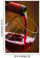 Wine pours into the glass of the bottle Wall Mural