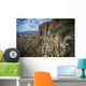 Rugged cliffs and plants on a landscape Wall Mural
