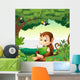A monkey reading a book at the forest Wall Decal