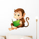 A Monkey Sitting While Reading a Book Wall Decal