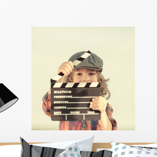 Kid Holding Clapper Board