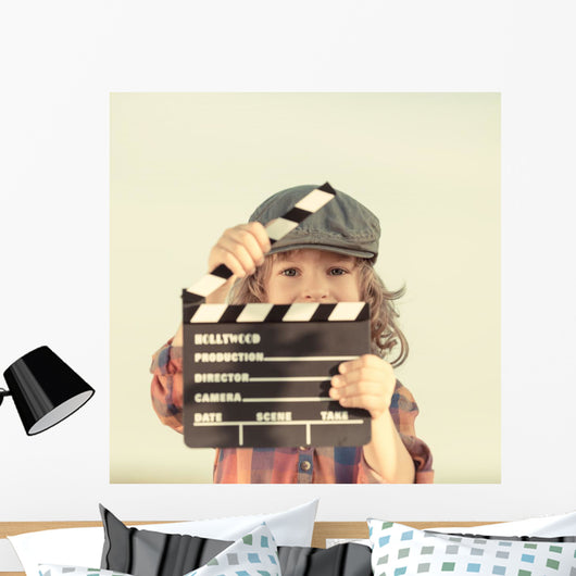 Kid Holding Clapper Board