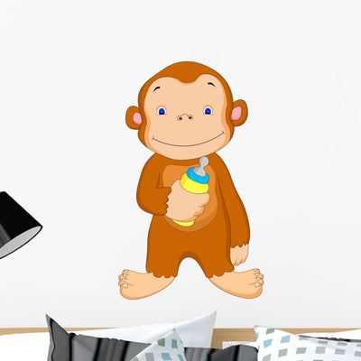 Cute Baby Monkey with shown on a wall