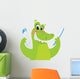 Happy crocodile holding toothbrush and toothpaste Wall Decal