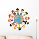 Many children holding their hands around Earth Wall Decal