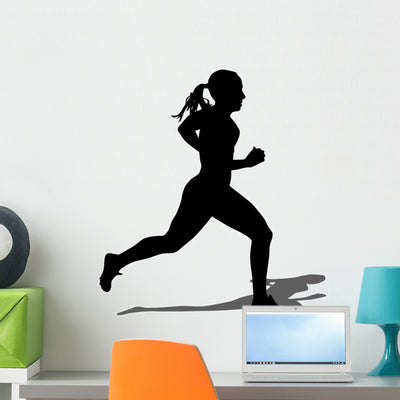 Running Silhouettes Vector Illustration shown on a wall