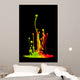 Colored splashes isolated on black background Wall Mural