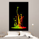 Colored splashes isolated on black background Wall Mural