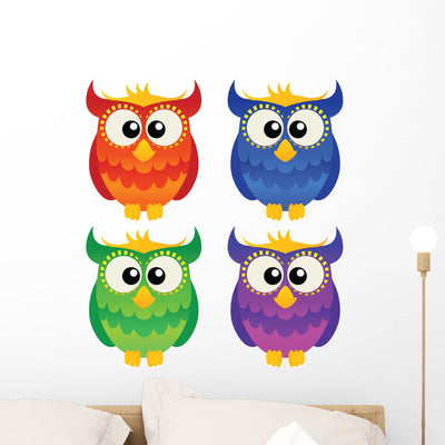 Set Four Cute Owls shown on a wall