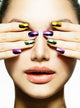 Manicure and Make-up. Nail art. Beauty Woman With Colorful Nails Wall Mural