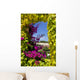 Window Covered With Ivy and Petunia Flowers Wall Mural