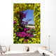 Window Covered With Ivy and Petunia Flowers Wall Mural