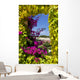 Window Covered With Ivy and Petunia Flowers Wall Mural