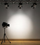 A vintage theater spotlight on a white background Wall Mural