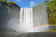 Islanda - cascata Skogafoss con due arcobaleni Wall Mural