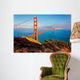 Golden Gate Bridge with hills in the evening light - San Francisco Wall Mural