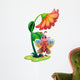 A butterfly waving below the giant flower Wall Decal