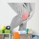 Woman having leg injury Wall Mural