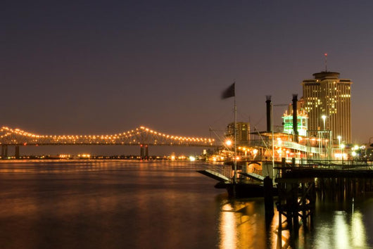 Hotels and bridge over Mississippi river at dusk, New Orleans Wall Mural