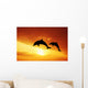 Dolphins at sunset Wall Mural