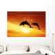 Dolphins at sunset Wall Mural